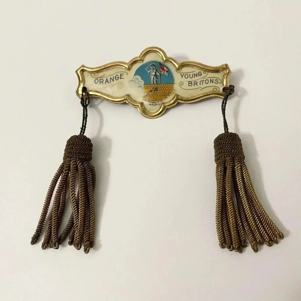 Vintage Orange Young Britons Pin with  Tassles Dom Regali Co Toronto
